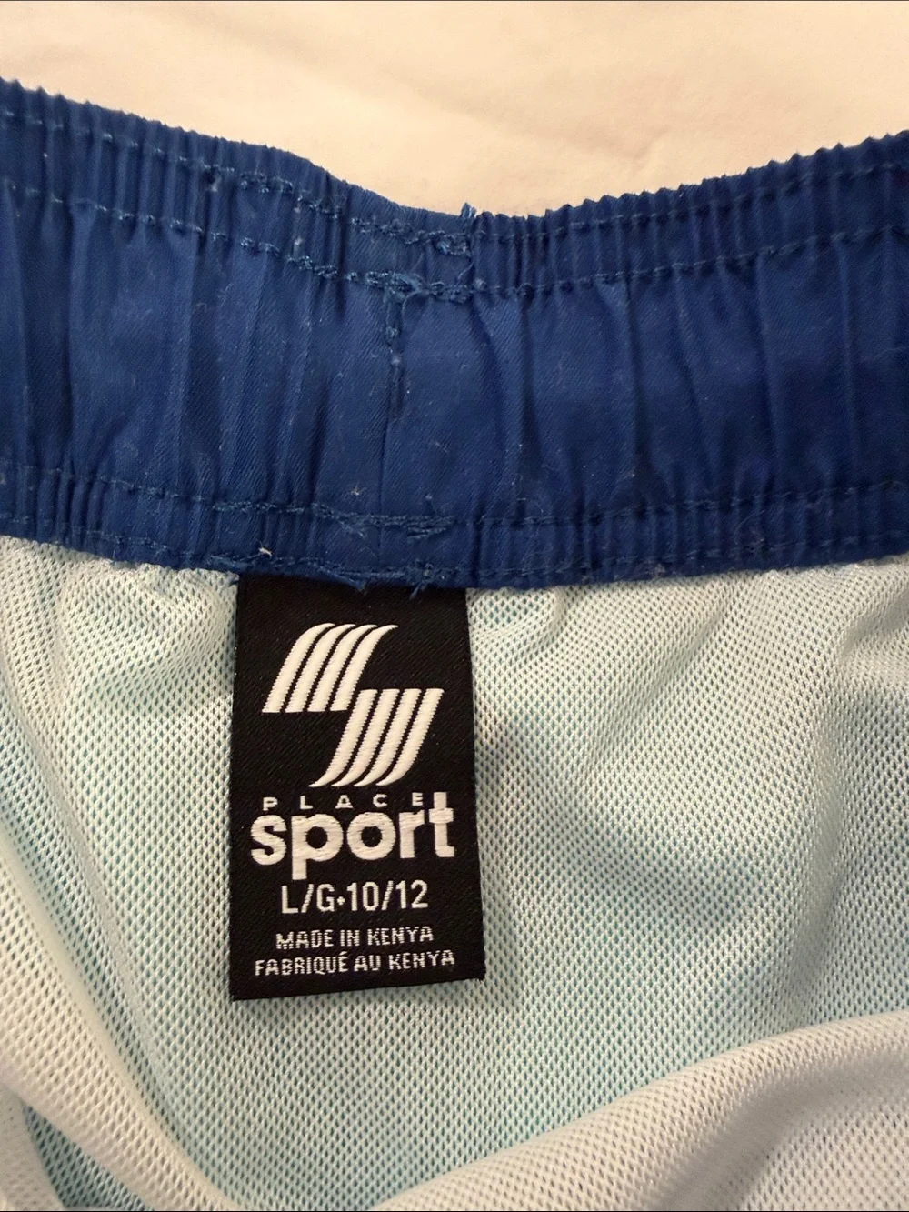 NWOT Kids Turquoise Swim Shorts with Navy Waistband and Orange Drawstring